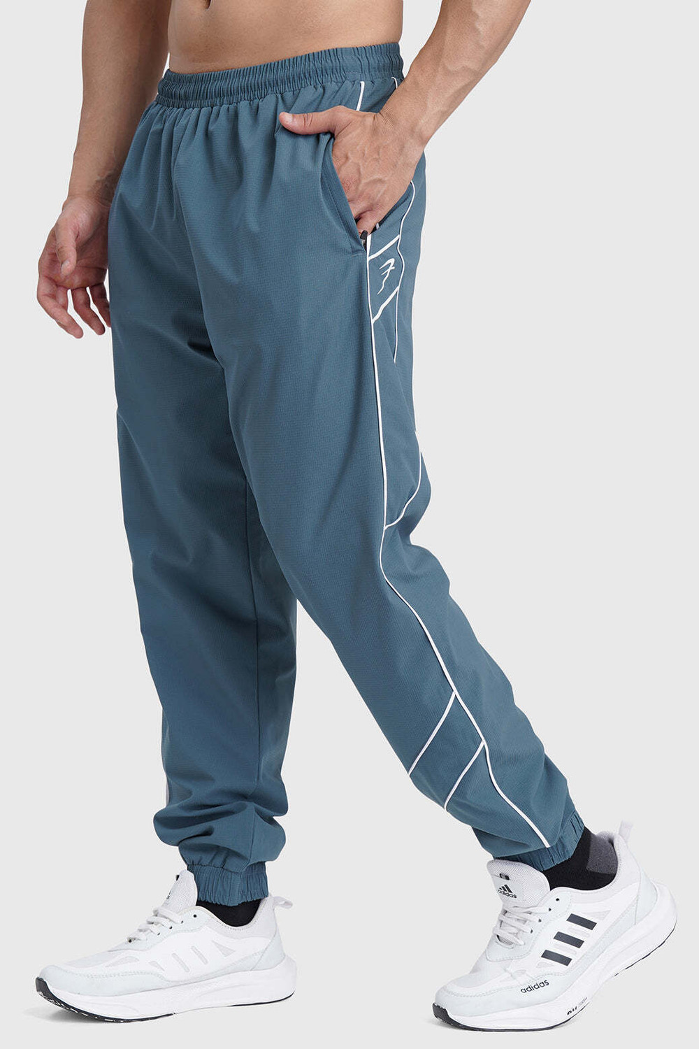 Image of FuaarK Men Solid Blue Track Pants