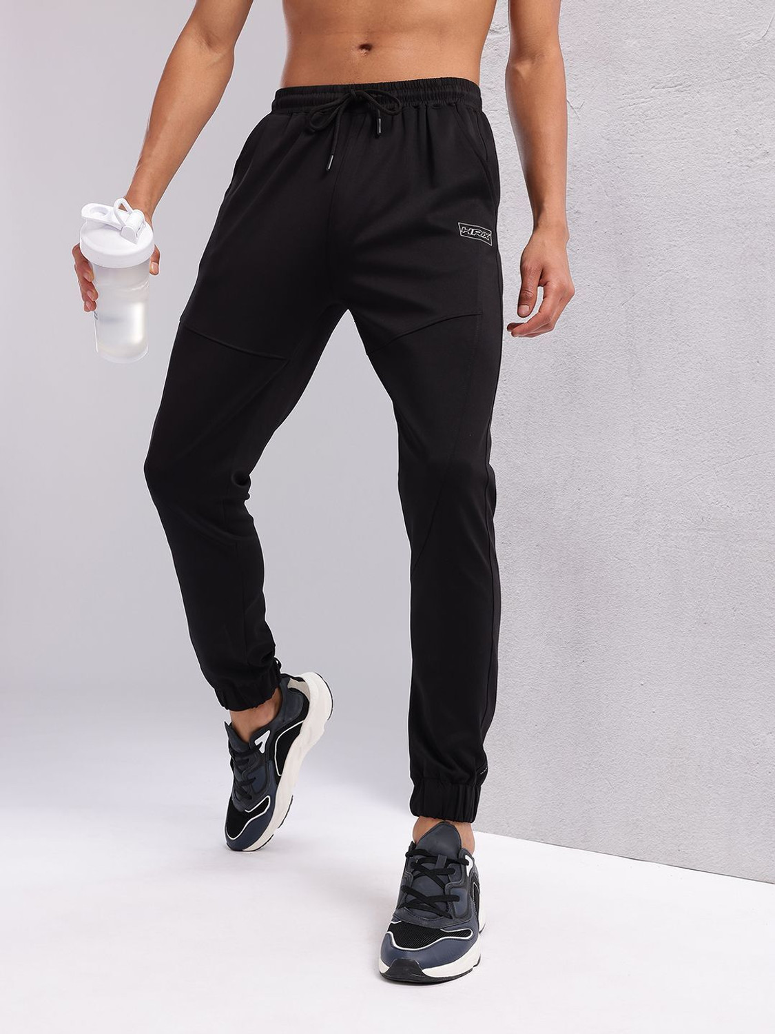 Image of FuaarK Men Solid Blue Track Pants