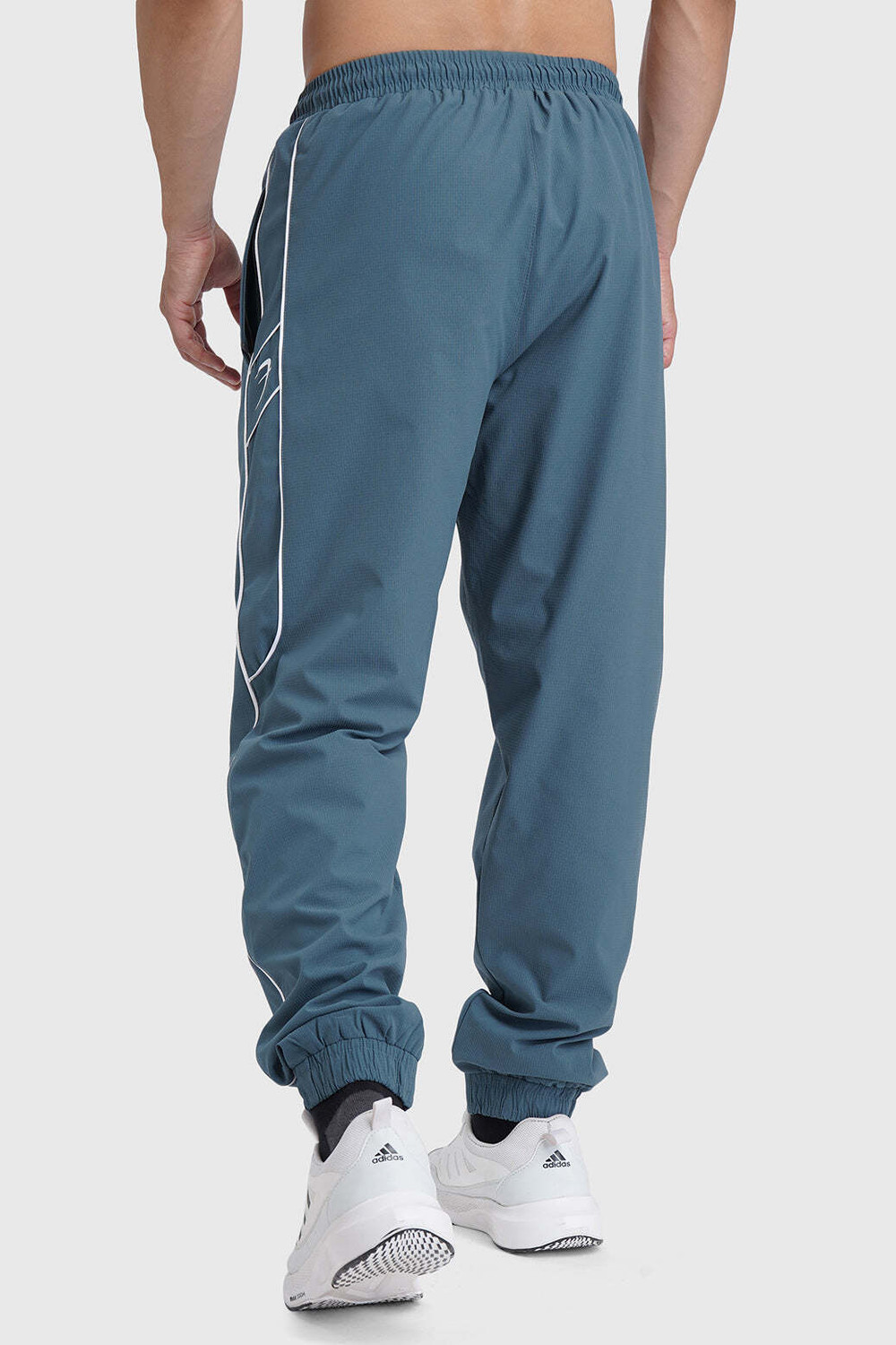 Image of FuaarK Men Solid Blue Track Pants