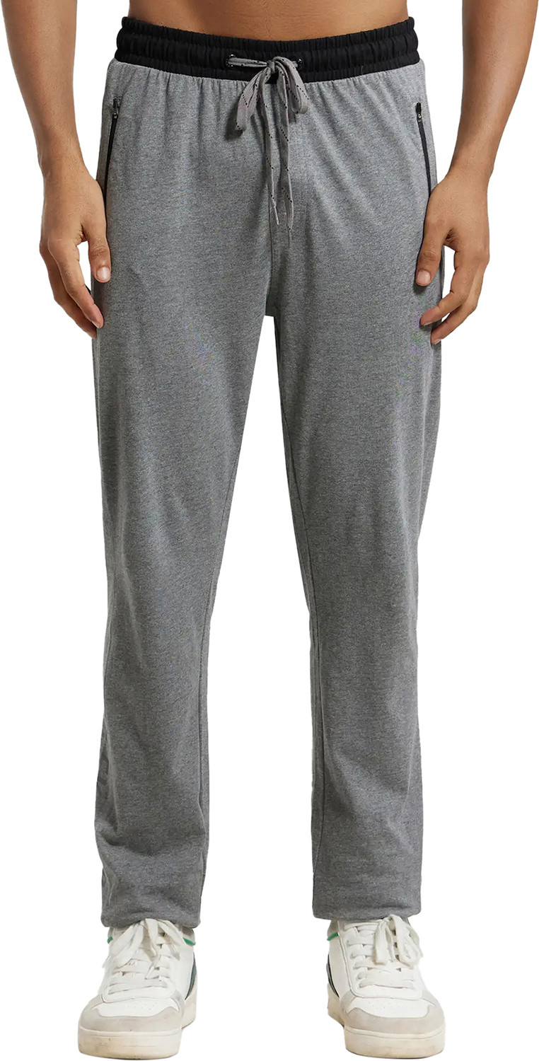 Image of PUMA EVOSTRIPE Core Pants Men Striped Blue Track Pants