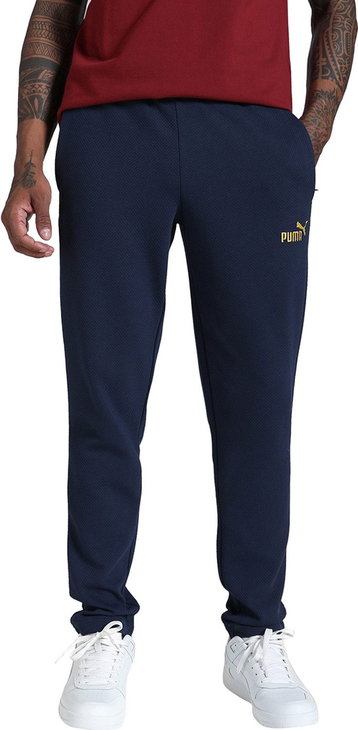 Image of PUMA EVOSTRIPE Core Pants Men Striped Blue Track Pants