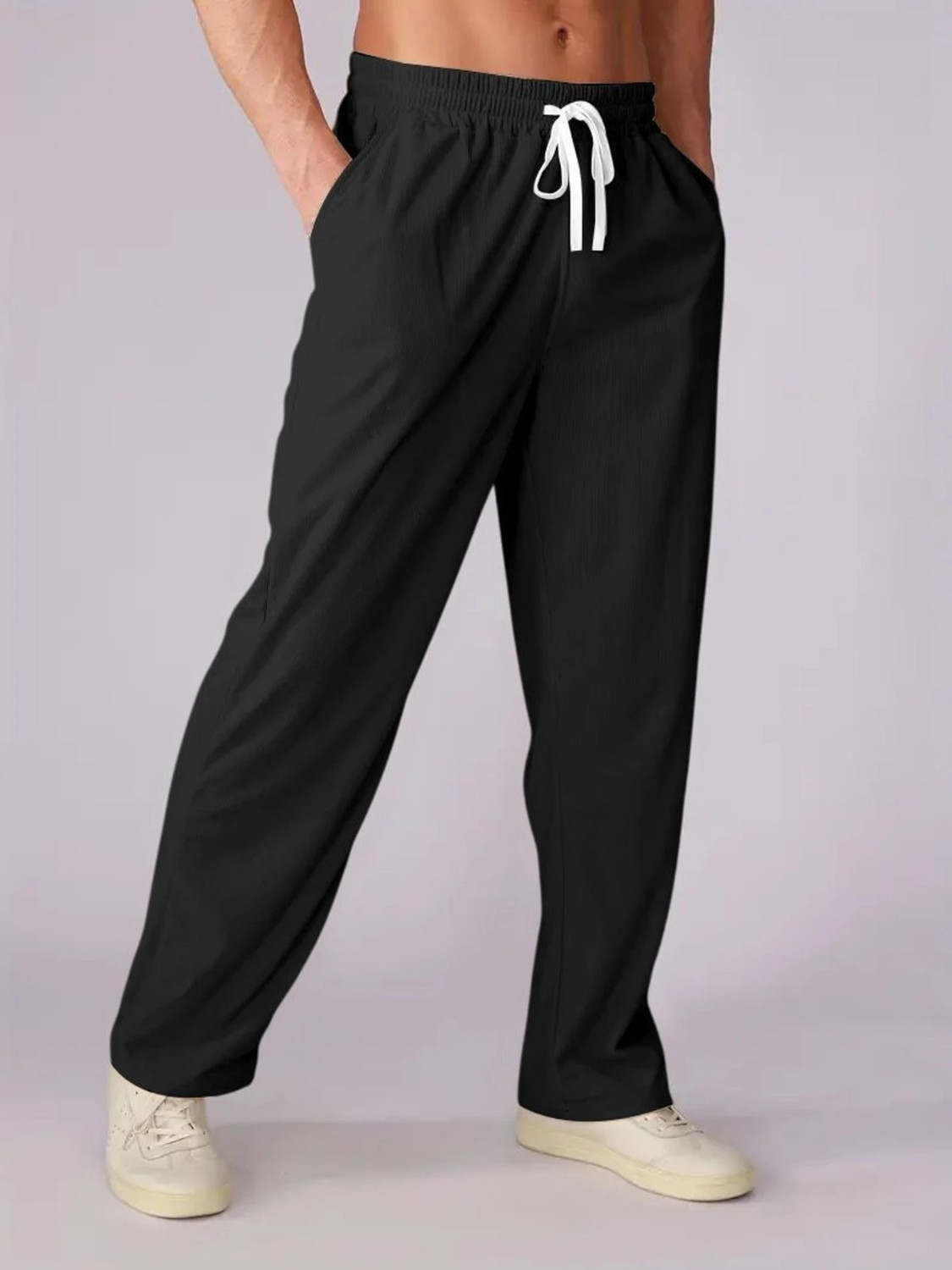 Image of COMBRAIDED Men Loose Fit Black Corduroy Trousers
