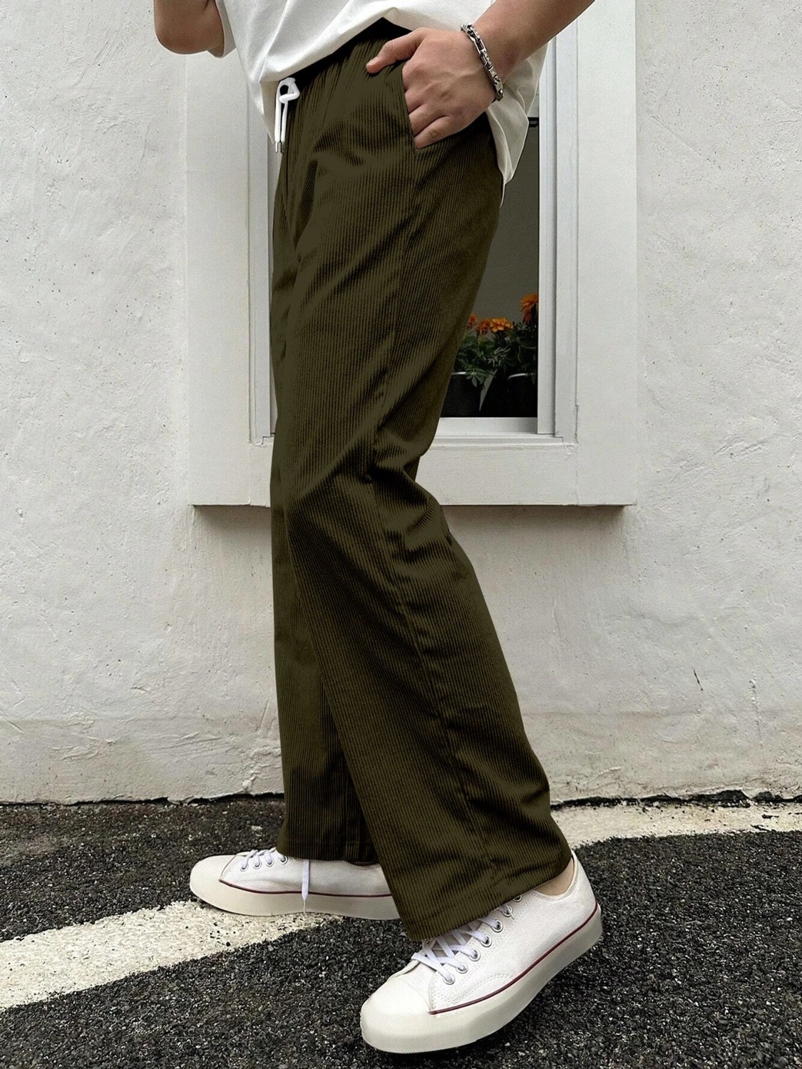 Image of COMBRAIDED Men Loose Fit Green Corduroy Trousers