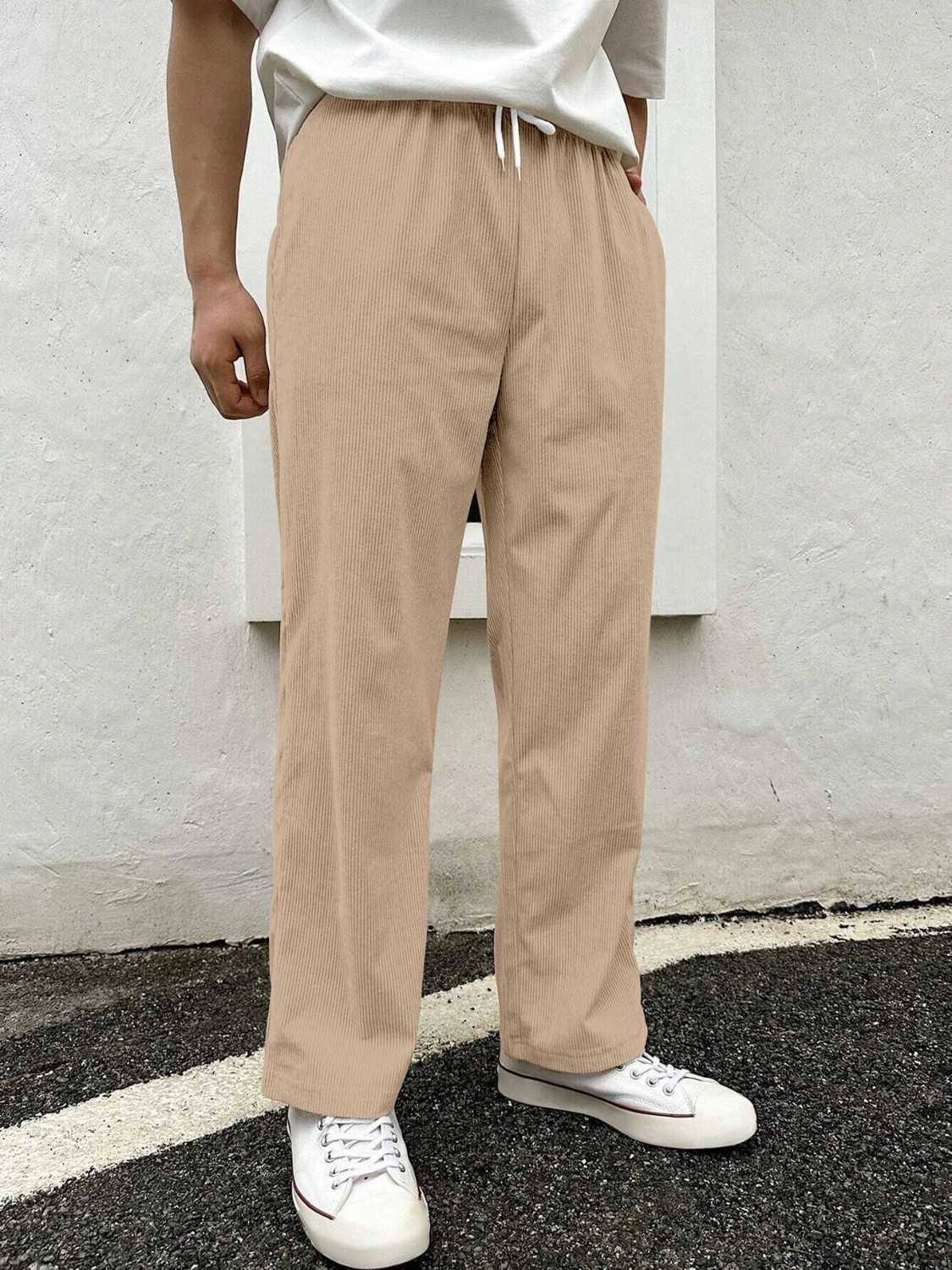 Image of COMBRAIDED Men Loose Fit Beige Corduroy Trousers