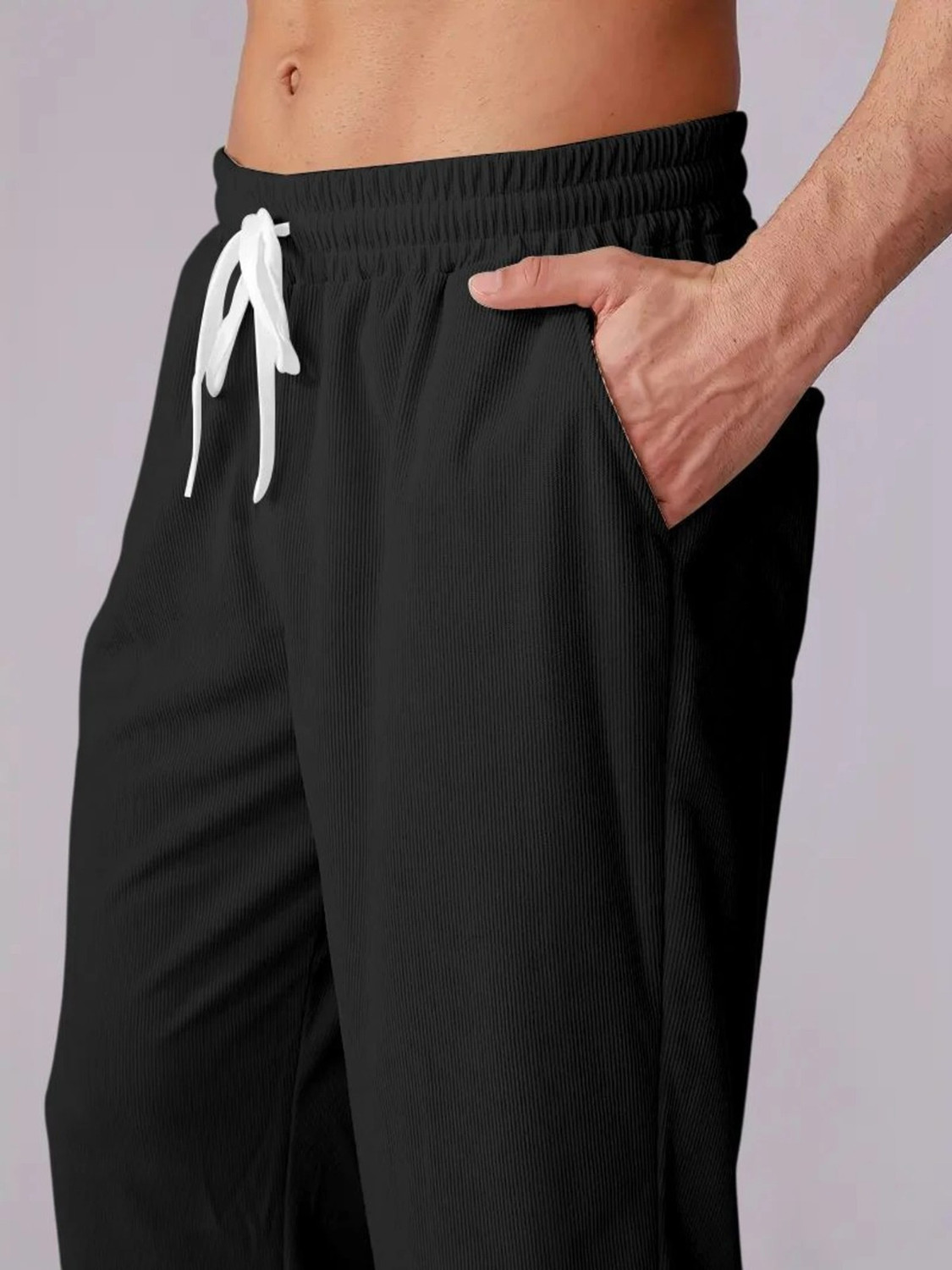 Image of COMBRAIDED Men Loose Fit Black Corduroy Trousers