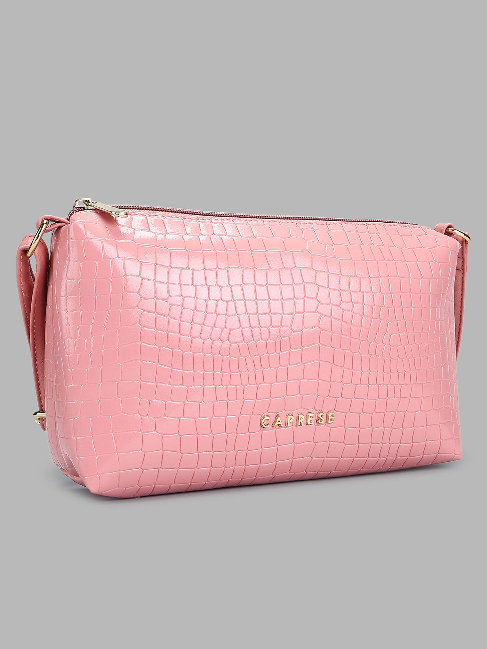 Caprese Suzie medium sling bag for women in textured faux leather