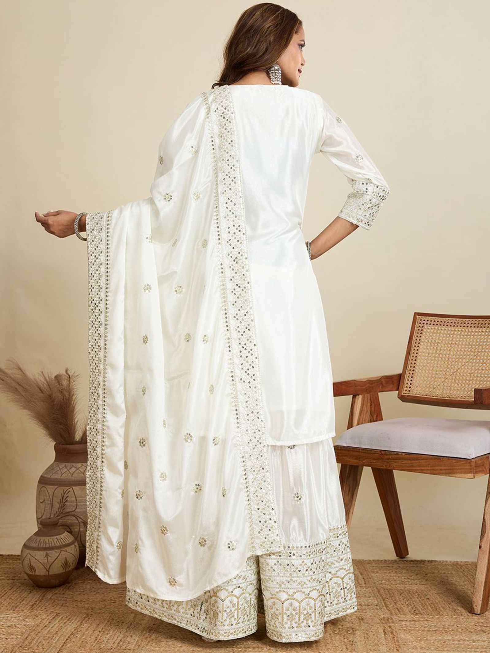 White embroidered sharara set from Shishkala for women — best white sharara set for daytime festive wear (representative image)