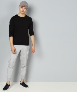 New Balance Solid Men Grey Track Pants
