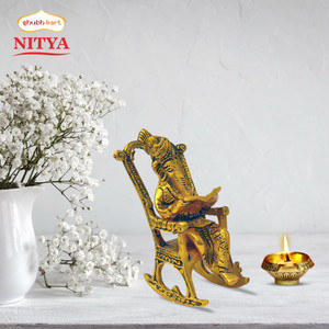 Shubhkart Nitya Lord Ganesha Reading Ramayana On Chair With Kuber Diya - 229 g Decorative Showpiece  -  15 cm