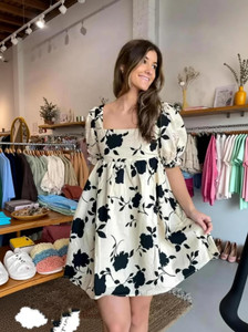 ROSHTA Women Fit and Flare White, Black Knee Length Dress