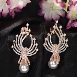 SARAF RS JEWELLERY Luxurious Pearl & AD Studded Contemporary Earring Cubic Zirconia Brass Stud Earring