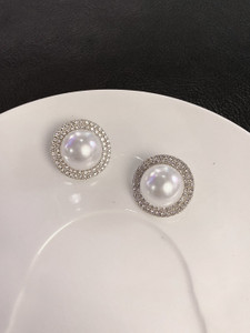Unwind by Yellow Chimes White Pearl and CrystalStudded Circular Stud Earrings Pearl Alloy Stud Earring