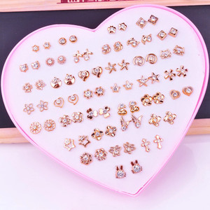 डिवाइन Combo of 36 pairs of Gold white studded stones Studs for Girls, Women(1 Box) Plastic Stud Earring