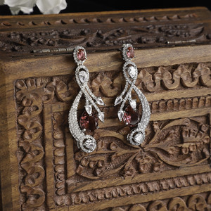 ZENEME Rhodium-Plated Red American Diamond studded Quirky Shaped Drop Earrings Cubic Zirconia Brass Drops & Danglers