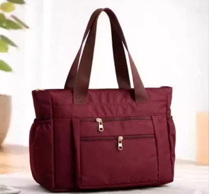 Unistore Women Maroon Handbag