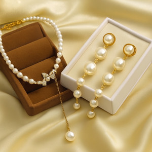 DEV VARNIKA Alloy Gold-plated White Jewellery Set