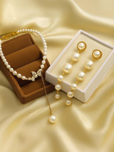 DEV VARNIKA Alloy Gold-plated White Jewellery Set