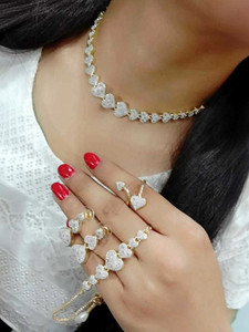 Navya COLLECTION Alloy Gold-plated White Jewellery Set
