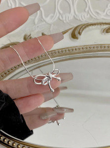 Jassa Korean Minimal Silver-Plated Bow Pendant Necklace for Women & Girls Crystal Platinum Plated Alloy Necklace