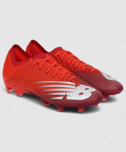 orange new balance football boots