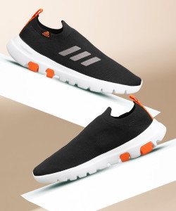 Nike black and orange shoes top