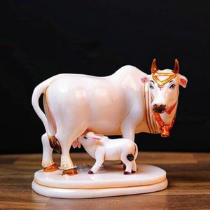 Rjkart Kamdhenu Cow with Calf decorative idol clean white finish with gold work Decorative Showpiece - 9 cm