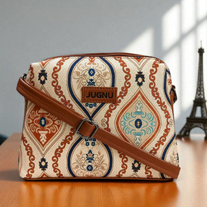 Jugnu Khaki Sling Bag Attractive printed design with vibrant colors_ Khaki leaves