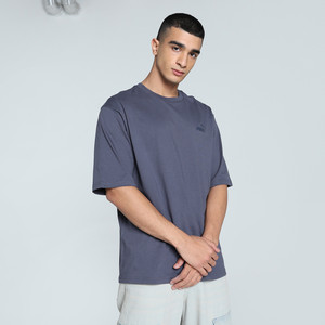PUMA Solid Men Round Neck Grey T-Shirt