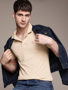 Calvin Klein Jeans Solid Men Polo Neck Beige T-Shirt