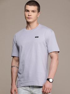 Calvin Klein Jeans Solid Men Round Neck Grey T-Shirt