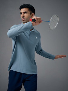 TECHNOSPORT Solid Men Polo Neck Light Blue T-Shirt