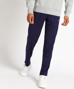 New Balance Solid Men Blue Track Pants