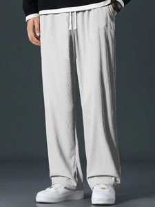 COMBRAIDED Loose Fit Men Grey Trousers