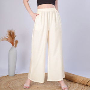 Vivika Flared Women Cream Trousers