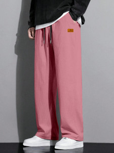 Rajovati Loose Fit Men Pink Trousers