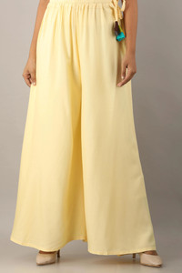 KANCHUK Flared Women Beige Trousers