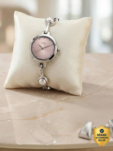 Titan NP2576SM01 Titan Raga Viva Pink Dial Silver Metal Strap Analog Watch  - For Women