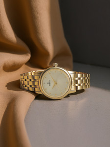 Titan NP2593YM01 Karishma Revive Analog Watch  - For Women