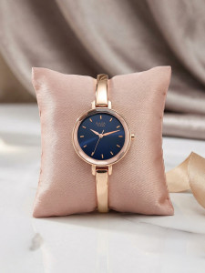 Titan NP2575WM02 Titan Raga Viva Blue Dial Rose Gold Metal Strap Analog Watch  - For Women