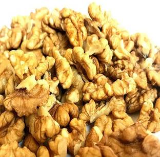 triangle 1 KG QUARTERR WALNUT AKHROT GIRI WITHOUT SHELL VACCUM PACKED Walnuts