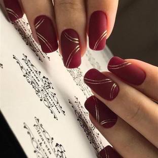 The NailzStation Golden Swirls Designer Fake Nails with glue application kit Maroon