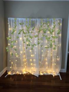 special you SpecialYou White net Curtain Cloth Backdrop for Decoration with Fairy led lights and Artificial Green Leaves- 9 Items