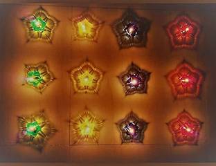 Da Novira 3D Reflection Diya Multi Shape & multicolor Diya for Diwali Decoration Packof 12 Plastic (Pack of 12) Table Diya Set