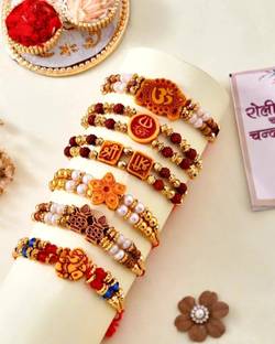 Flipkart SmartBuy Designer Rakhi Combo of 6 Dora Rakhi Set for Brother Bhai Bhabhi Kids with Roli Chawal and Best Wishes Greeting Card, rakhi set of 6 Mauli Thread Rakhi, Chawal Roli Pack, Greeting Card  Set