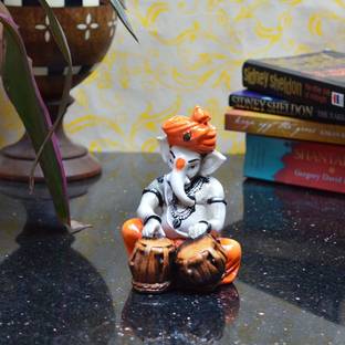 eCraftIndia Lord Ganesha Playing Tabla Decorative Showpiece  -  12.7 cm