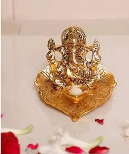 Chandra Art Collection Lord Ganesh Sitting on Leaf With Diya Decorative Showpiece  -  8 cm
