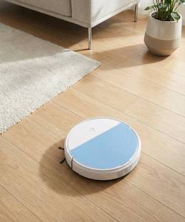 Raptas Vacuum Robot Cleaner is a Small, Circular Sweeper That has a Long Battery Life Robotic Floor Cl...