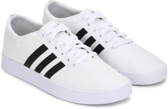 white adidas flat shoes