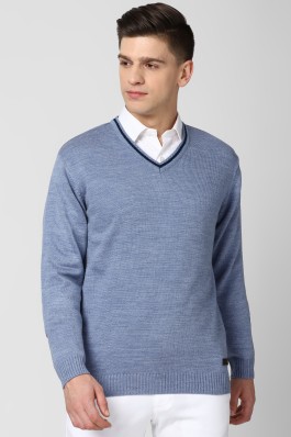 blue sweater white shirt