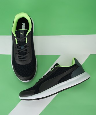 lime green and black puma shoes